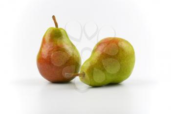 two ripe pears on white background