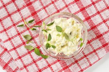 Bowl of crumbly white cheese spread