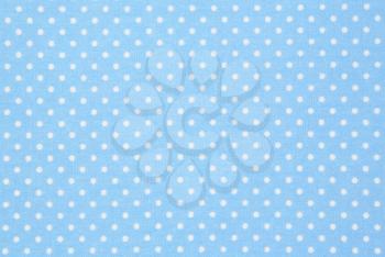 detail of dotted blue fabric