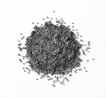 Heap of whole poppy seeds on white background