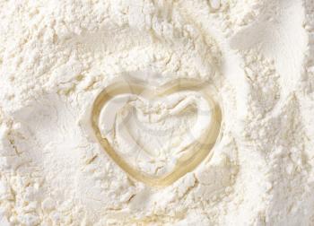 Heart shape drawn in wheat flour
