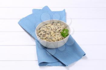 bowl of wild rice on blue place mat