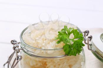jar of cooked rice pasta fusilli - close up