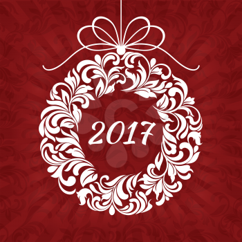 Christmas floral wreath with 2017 on a red background with rays