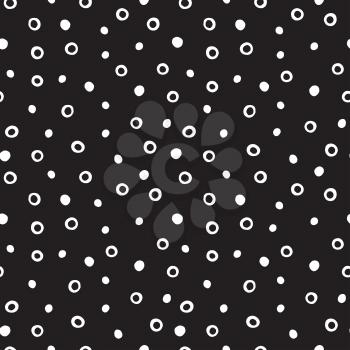 Grunge hand drawn seamless pattern. Circles, rings and dots on a black background.  Ideal for textile print