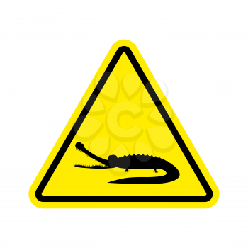 Attention crocodile. Alligator on yellow triangle. Road sign Caution predator reptile
