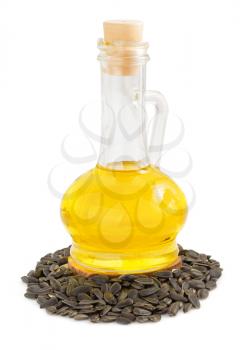 sunflower oil and seeds isolated at white background