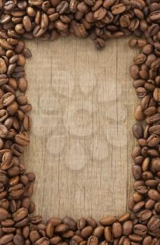 coffee beans on wood background texture