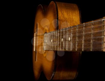 classical guitar on black background