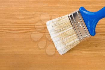 paintbrush painting on wood board background texture