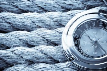 ship ropes and compass