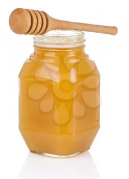 jars full of honey isolated on white background