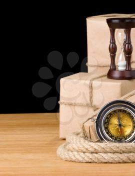 parcel wrapped box and rope isolated on black background