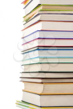 pile of new books isolated on white background