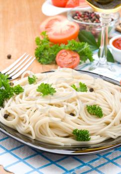 spaghetti food and vegetables spices on wood table
