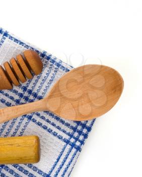 wood utensils at table napkins isolated on white background