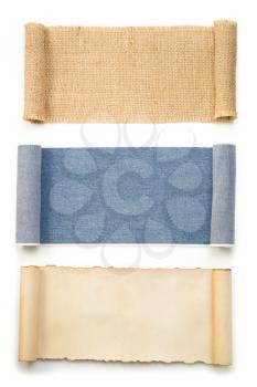 blue jeans and burlap sack roll isolated on white background