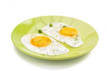 fried egg in plate isolated on white background