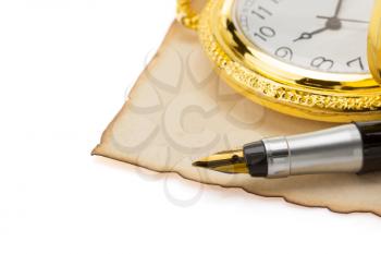 watch and pen at vintage parchment isolated on white background