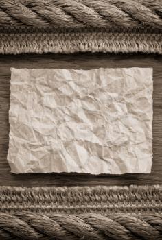 ropes and sack burlap on wooden background