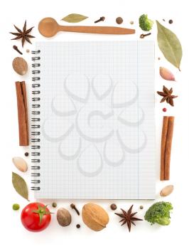 food ingredients and recipe book on white background