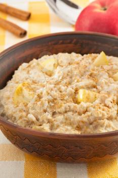 bowl of oatmeal on tablecloth background