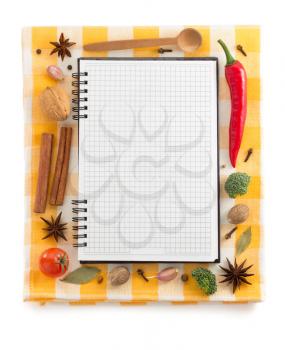 food ingredients and recipe book on white background