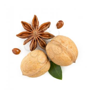 walnuts and anise star isolated on white background