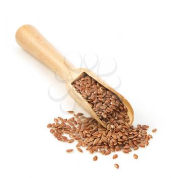 flax seeds in scoop isolated on white background