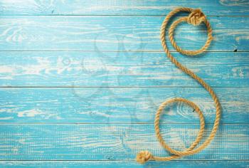 ship rope on wooden background