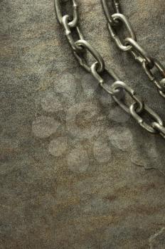 metal chain at stone background