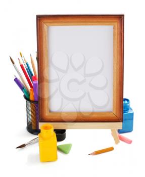 paint supplies and frame isolated on white background