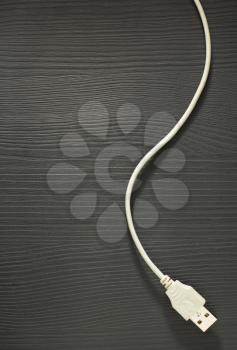 cord on wooden background