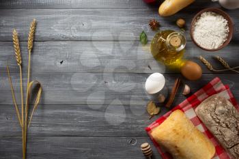 bread and bakery products on wood background