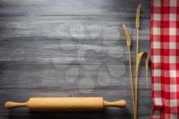 ears of wheat  on wooden background