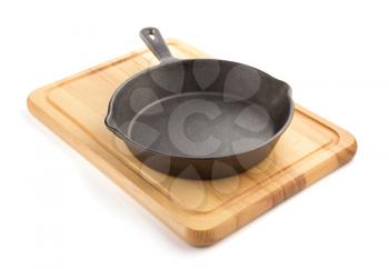 frying pan and board isolated on white background
