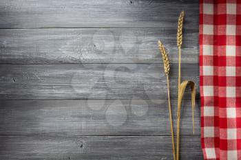 ears of wheat  on wooden background