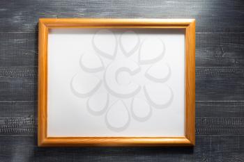 photo picture frame at wooden background texture