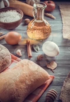 bread and bakery products on wooden background