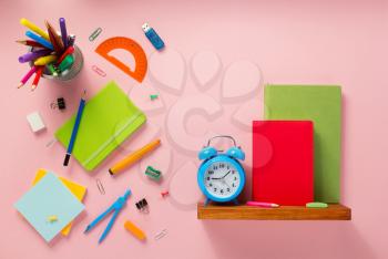 school accessories and supplies at abstract background surface