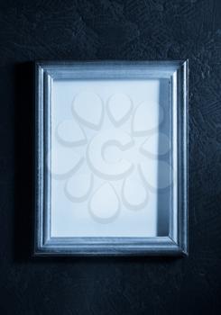 photo picture frame at black background texture