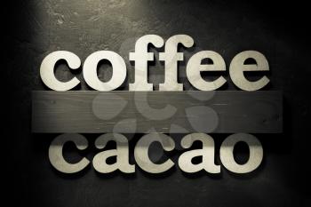 coffee and cacao letters on black background