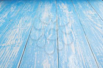 empty blue wooden table in front, plank board background texture surface