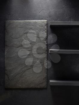slate stone and wall shelf on black background texture