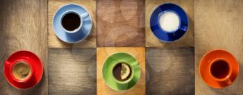cup of coffee, tea and cacao at wooden background