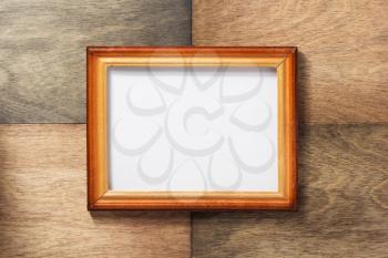 photo picture frame at wooden background