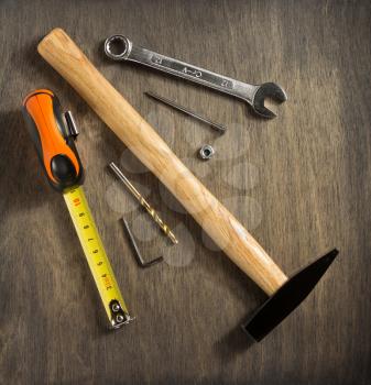 set of  tools and instruments on wooden background