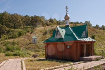 Chapel about a spring. The equip swimming bath and a spring in the basis of the mountain
