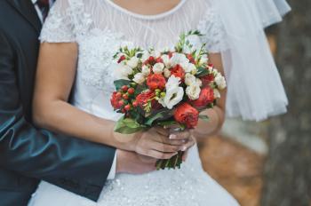 Bouquet in female hands.