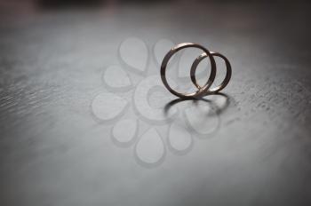 Wedding rings on the table.